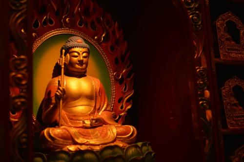 A statue of Buddha in Buddha Tooth Relic Temple, Singapore.